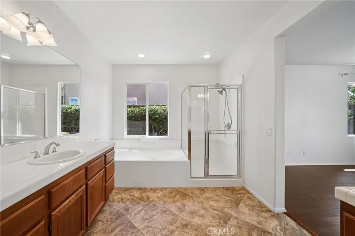 Bright primary bathroom with functional layout