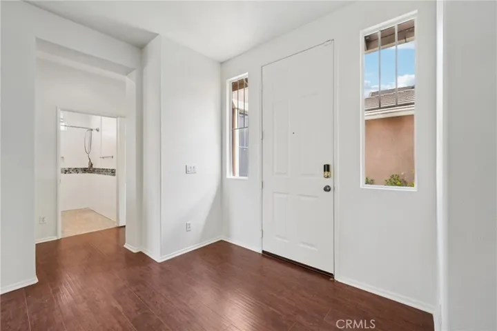 Private entry with direct access to adjacent living space and bathroom