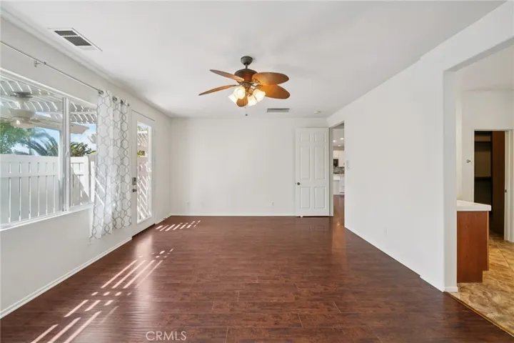 Spacious primary bedroom with private courtyard access