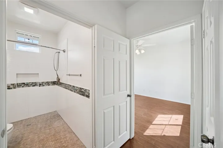 bathroom with walk-in shower for ease and convenience
