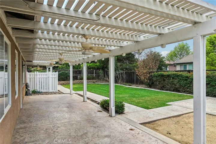 Covered patio with pergola and outdoor living space