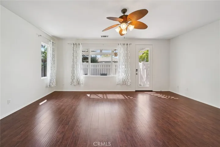 Spacious primary bedroom with private courtyard access