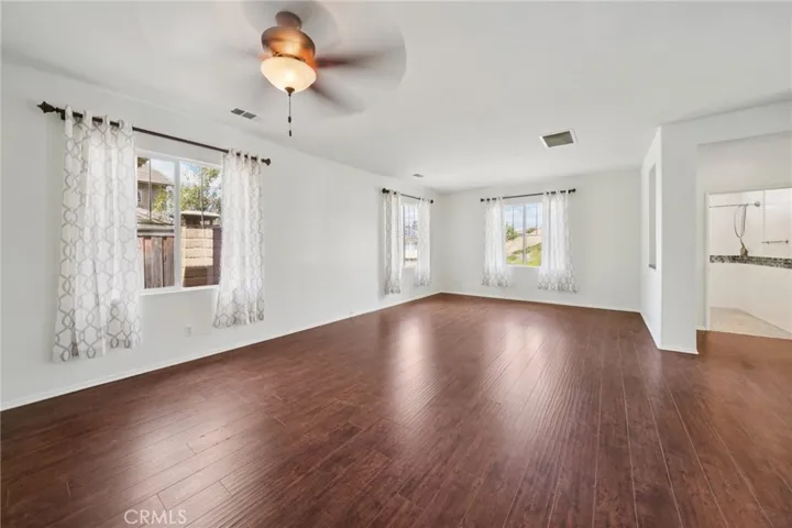 Flex space with adjacent bedroom and walk-in shower