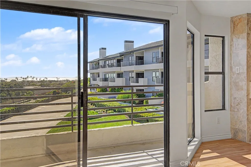Balcony off living room includes a gas hookup for your barbeque.