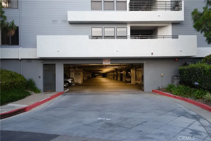 Gated secure parking garage below.