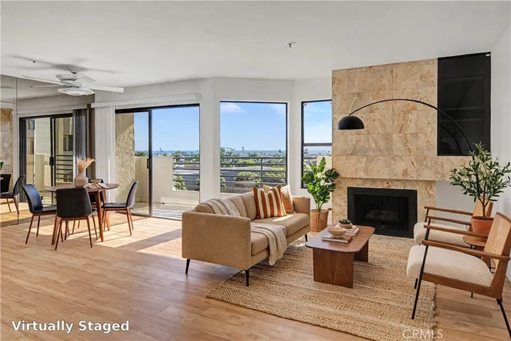 Living Room with Sliding Door to Ocean View Balcony (Virtually Staged)