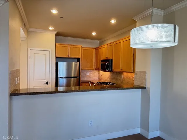 Other side of the kitchen from dining room