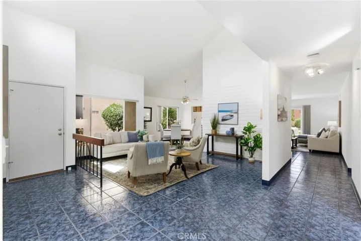 Living room view with the entry door to the left