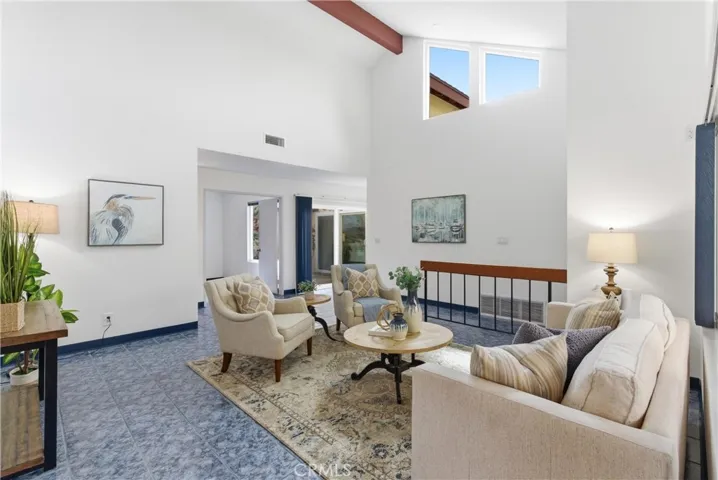 Living room with vaulted ceilings