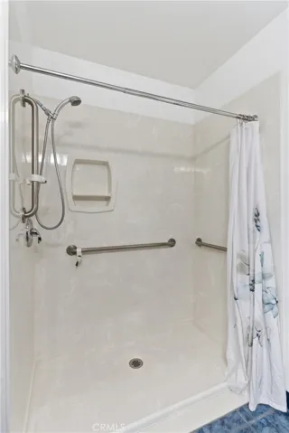 Hallway bathroom with walk-in shower