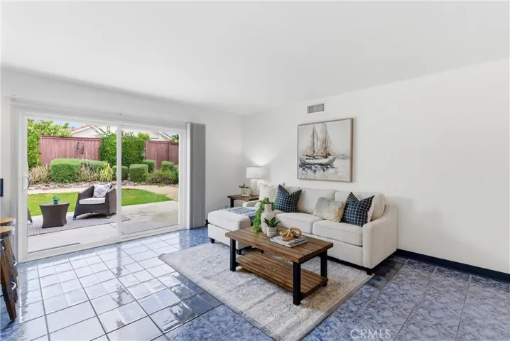 Family room with sliding door access to the backyard