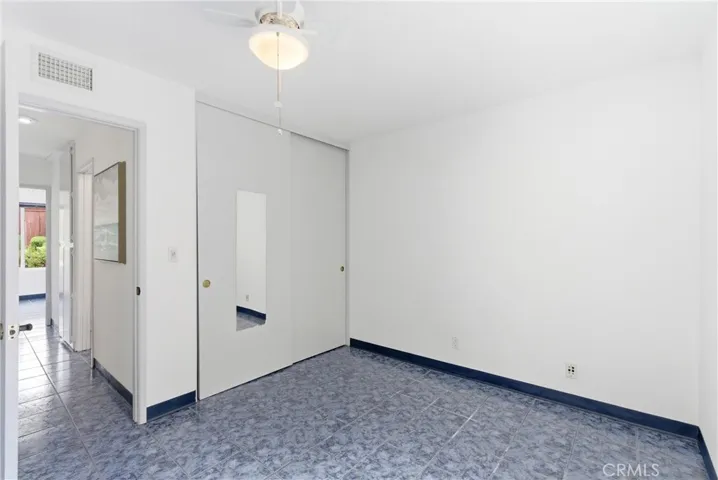 Bedroom 2 with dual closet doors