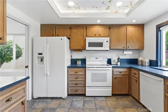 Recessed lighting & oak cabinetry