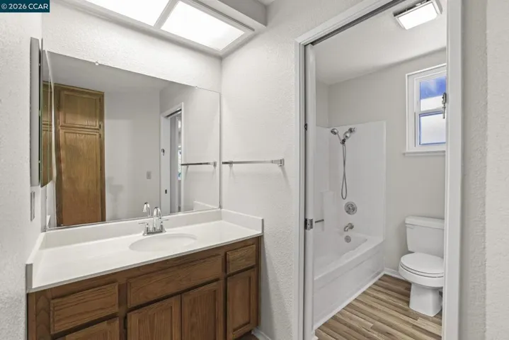 Two separate sink & storage areas