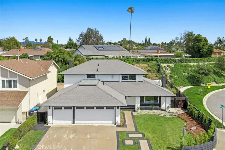 Ample Parking in both the Driveway & 3 Car Garage
