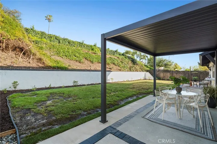 An updated fence, and additional hillside sprinklers