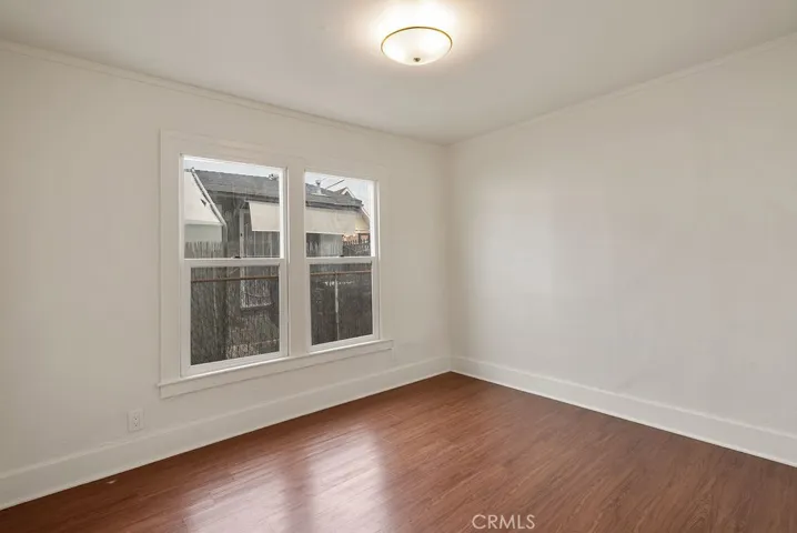 Bedroom 2 - Rear Unit
Single hung windows with large baseboards!