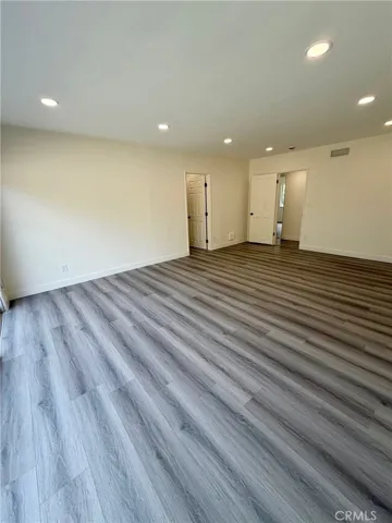 Enormous master suite w/recessed LED lighting on dimmers.