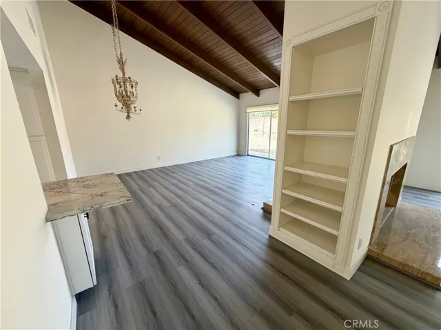 Family room w/vaulted ceiling & room for a dining room table if you like.