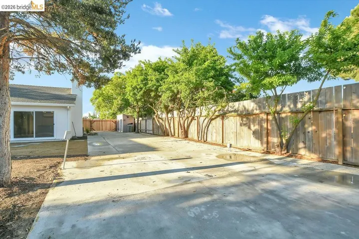 View of fenced backyard