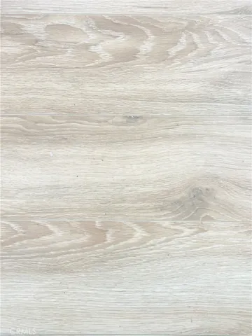 Vinyl Through throughout except for kitchen