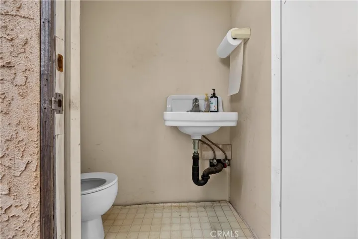 2ND RESTROOM AT BACK OF THE BUILDING