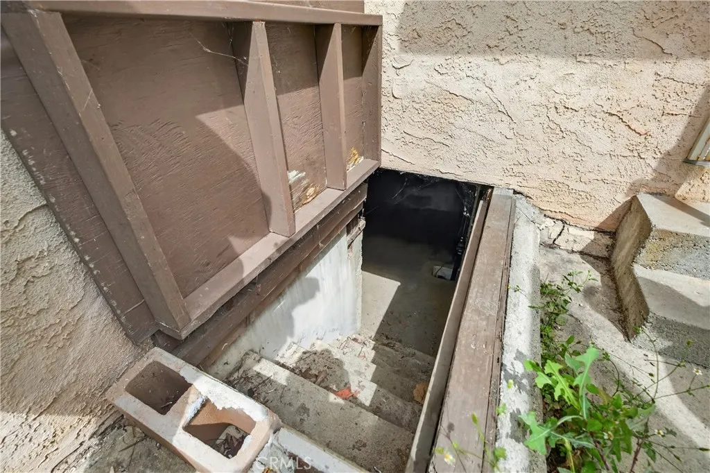BASEMENT ACCESS FOR STORAGE AND UNDER THE BUILDING ACCESS