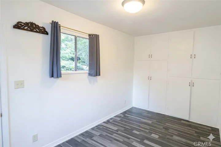 Bedroom #1 with wall closet and cabinets
