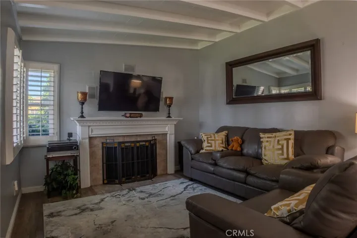 Inviting living room featuring a fireplace and warm ambiance