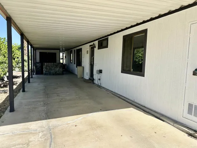 Long carport with Shed.