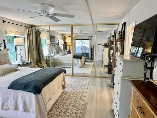 Plenty of mirrored sliding closet space for easy access