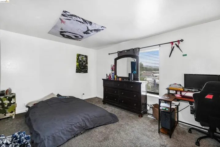 Bedroom 2, natural light flows into the room.