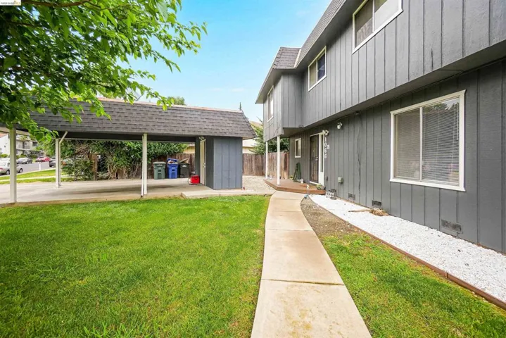 View of home's community featuring an outdoor structure