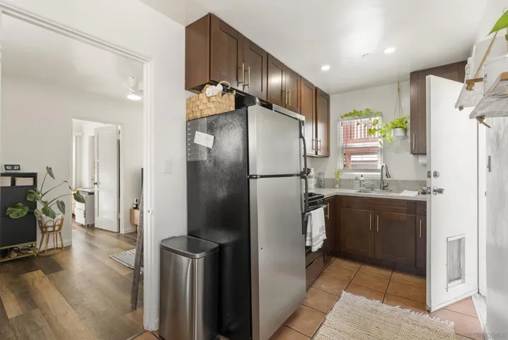The door to the backyard of this unit is in the kitchen.