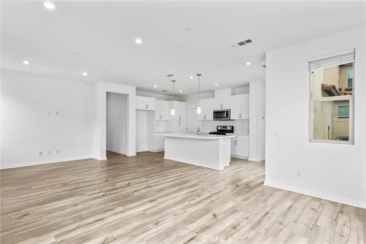 Great room combining kitchen, living, and dining