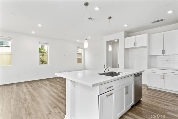 Great room combining kitchen, living, and dining
