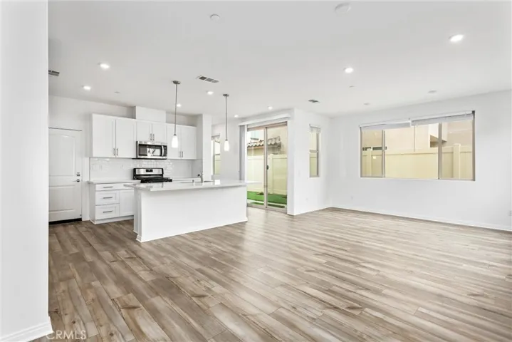 Great room combining kitchen, living, and dining