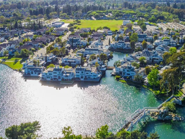 South Lake Middle School is on the left side of the grassy area and Meadowpark Elementary School is on the right side of the grassy area.