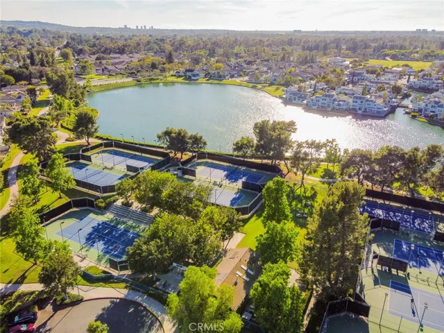 Many tennis courts are next to the South Lake at Woodbridge Village.