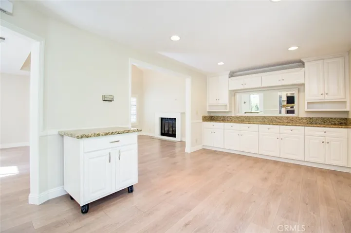 Another view of the family room with build-in cabinets.