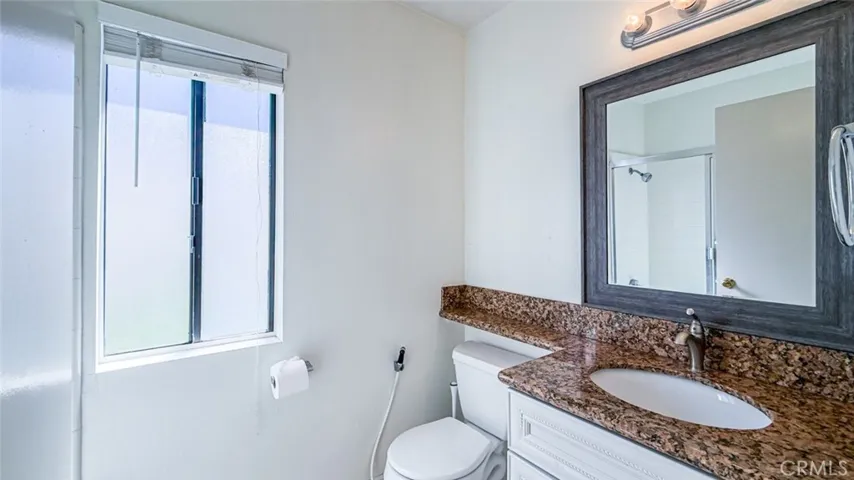 The second bathroom with tub/shower