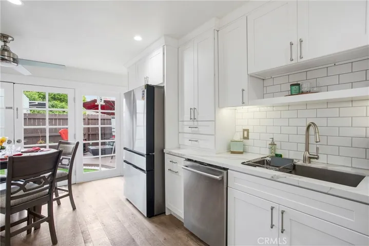 Kitchen opens to large private patio.