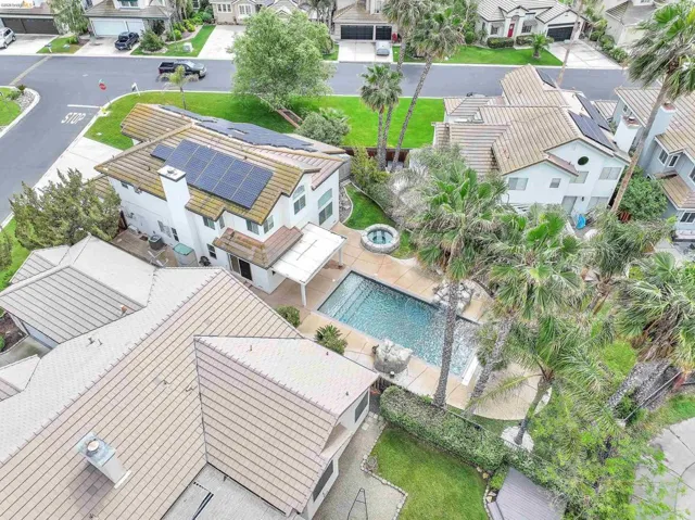 Aerial view of residential area with a pool area
