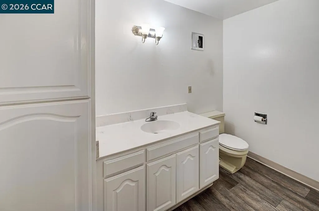 first view of bathroom with linen closet