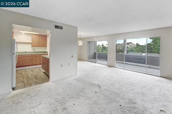 Living room with first look at kitchen