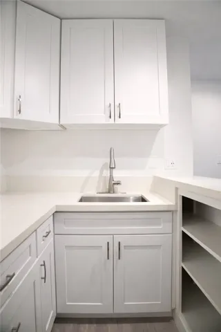 Clean-lined kitchen with updated hardware and efficient layout.