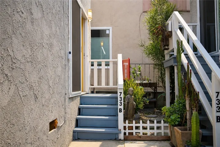 Patio setting enhanced by greenery.