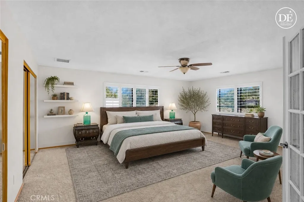 Virtually staged primary bedroom suite