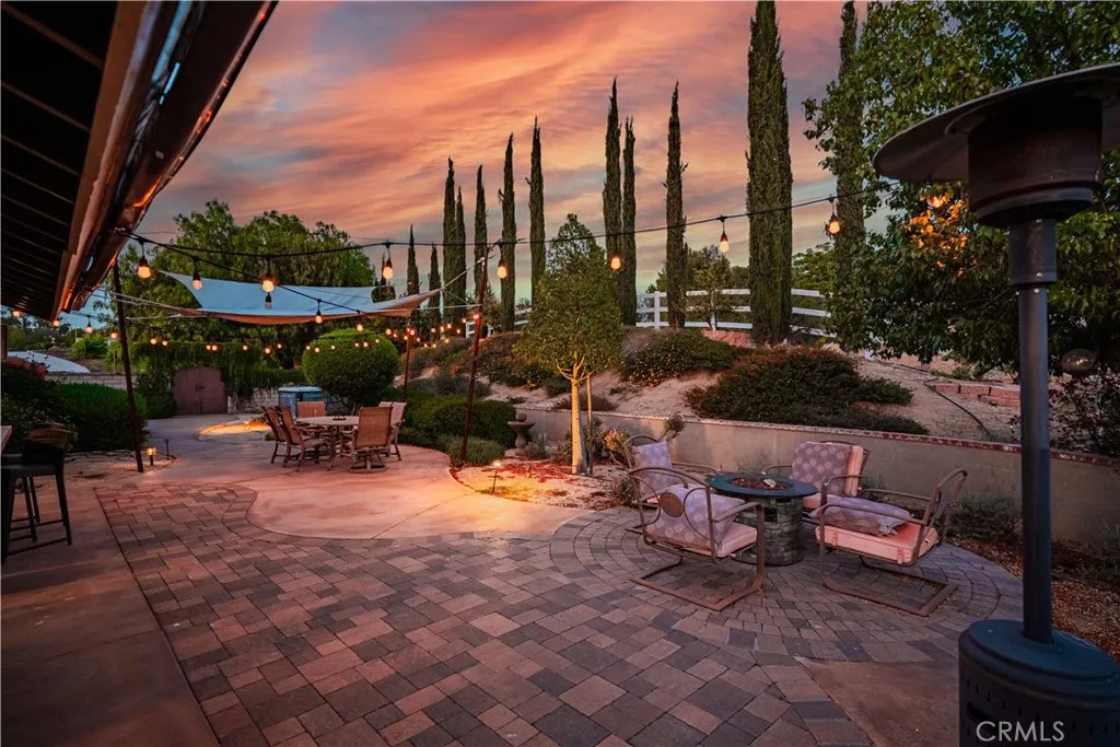 Evening shot of fire pit and dining area
