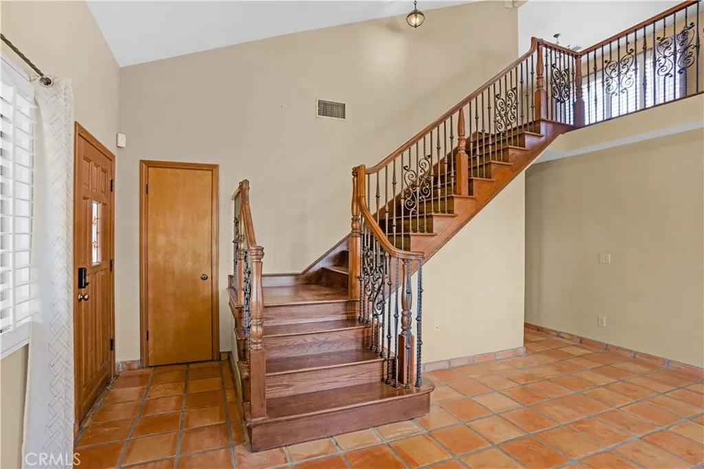 Wood and iron staircase is the jewel of the house